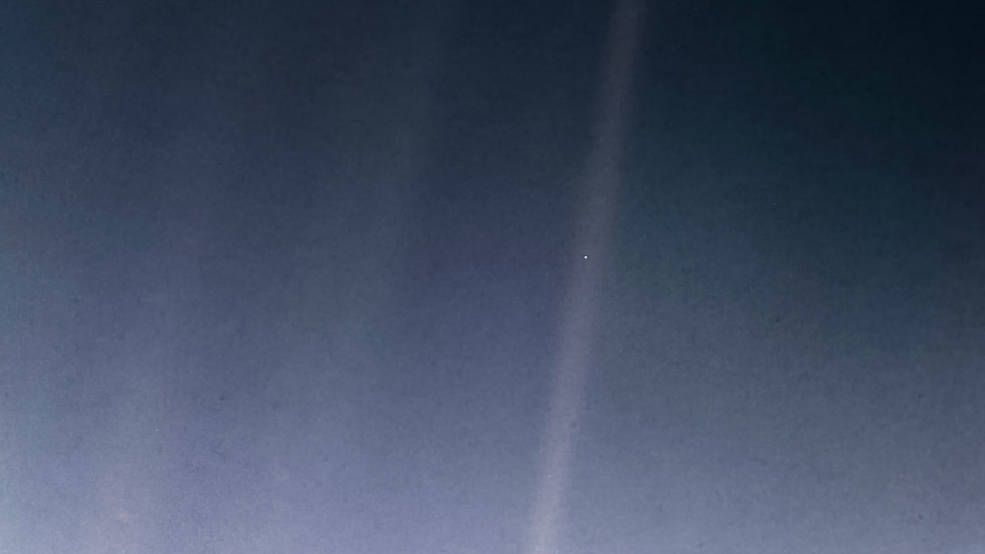 A Speck in the Cosmic Ocean: The Intriguing Tale of the Pale Blue Dot